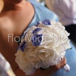 White hydrangea hand tied bouquet with an elegant blue touch